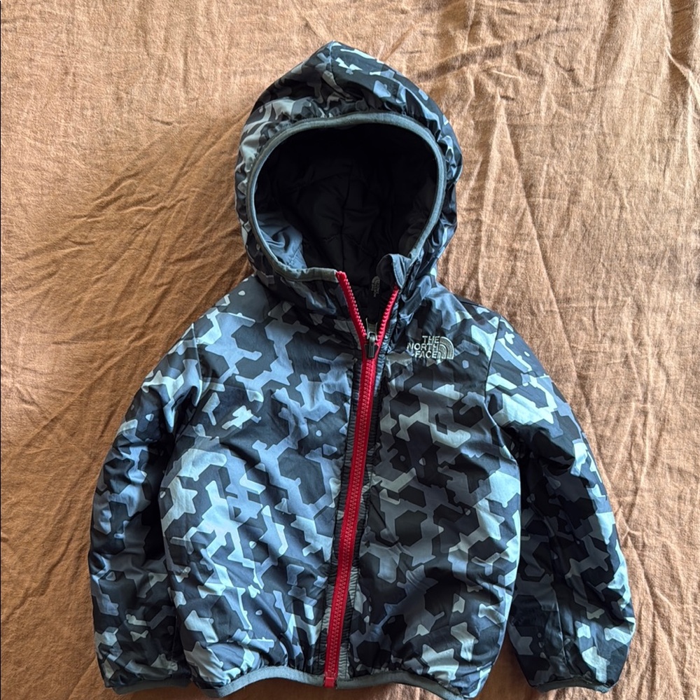 The North Face Kids' Reversible Camouflage Jacket with Red Zipper